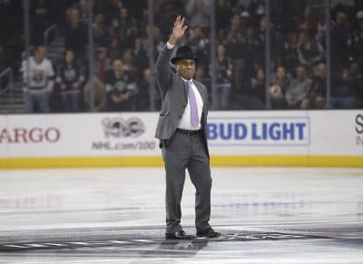 Willie O'Ree, the first black player in the National Hockey League is honored before an NHL hockey game between the Los Angeles Kings and the Tampa Bay Lightning in Los Angeles, Monday, Jan. 16, 2017. (AP Photo/Alex Gallardo)