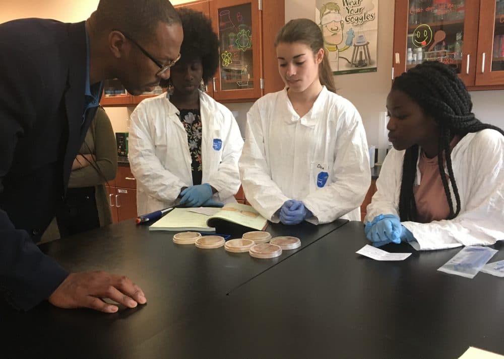 Massachusetts Life Sciences President and CEO Travis McCready visits with Worcester students participating in the MLSC high school apprenticeship program.
