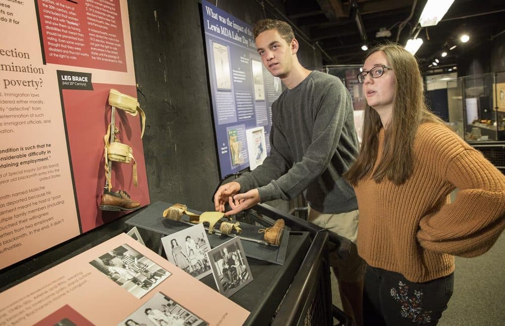 Gann Academy students Gabe Rosen and Elianna Gerut are two of the curators of the &quot;Disability History of the United States&quot; exhibit at the Charles River Museum of Industry & Innovation in Waltham, Mass. (Robin Lubbock/WBUR)