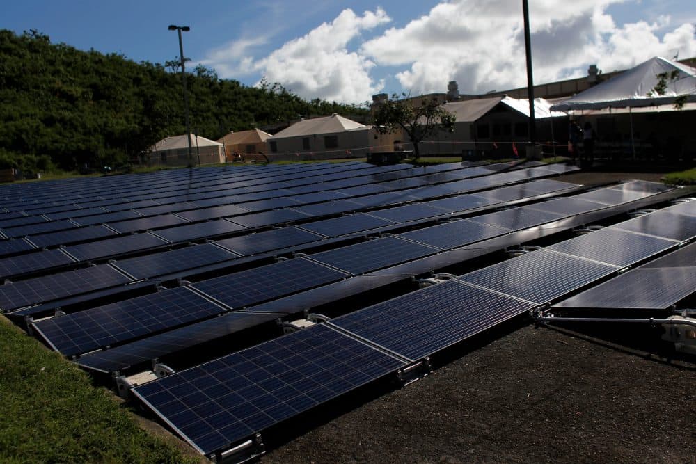 Solar panels set up by Tesla Industries are seen at a hospital in Vieques, Puerto Rico, on Nov. 27, 2017. (Ricardo Arduengo/AFP/Getty Images)