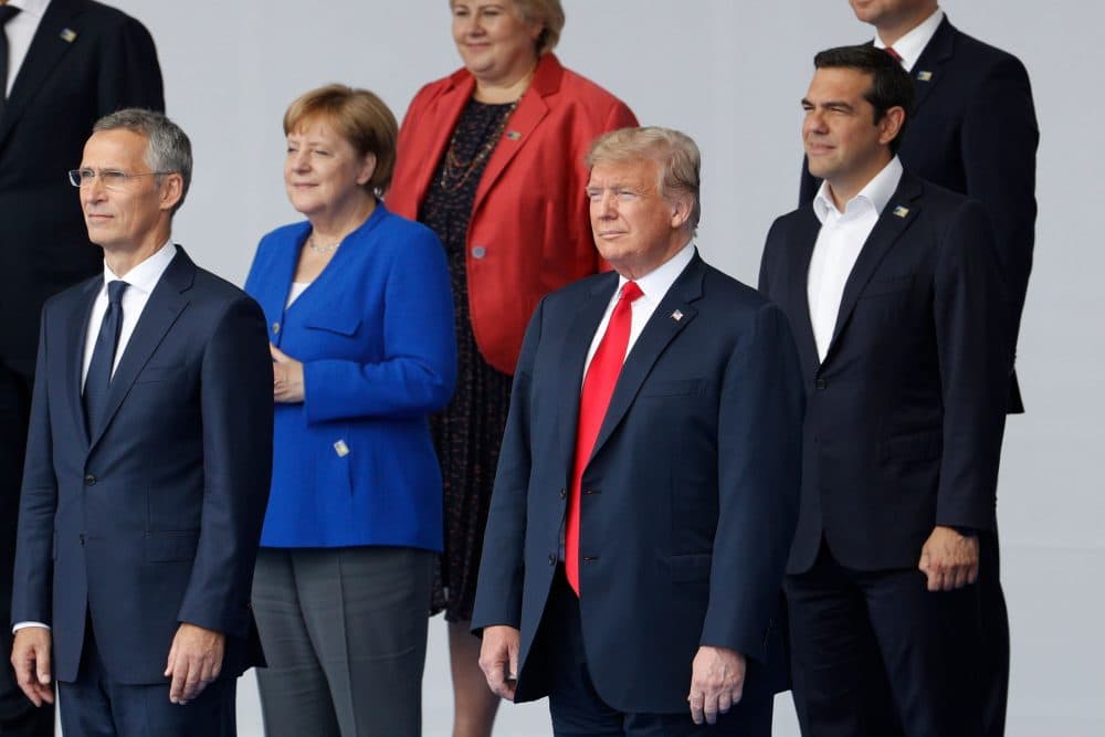 NATO Secretary General Jens Stoltenberg, German Chancellor Angela Merkel, President Trump and Greek Prime Minister Alexis Tsipras pose for a family photo ahead of the opening ceremony of the NATO summit at the NATO headquarters in Brussels, on July 11, 2018. (Geoffroy Van Der Hasselt/AFP/Getty Images)
