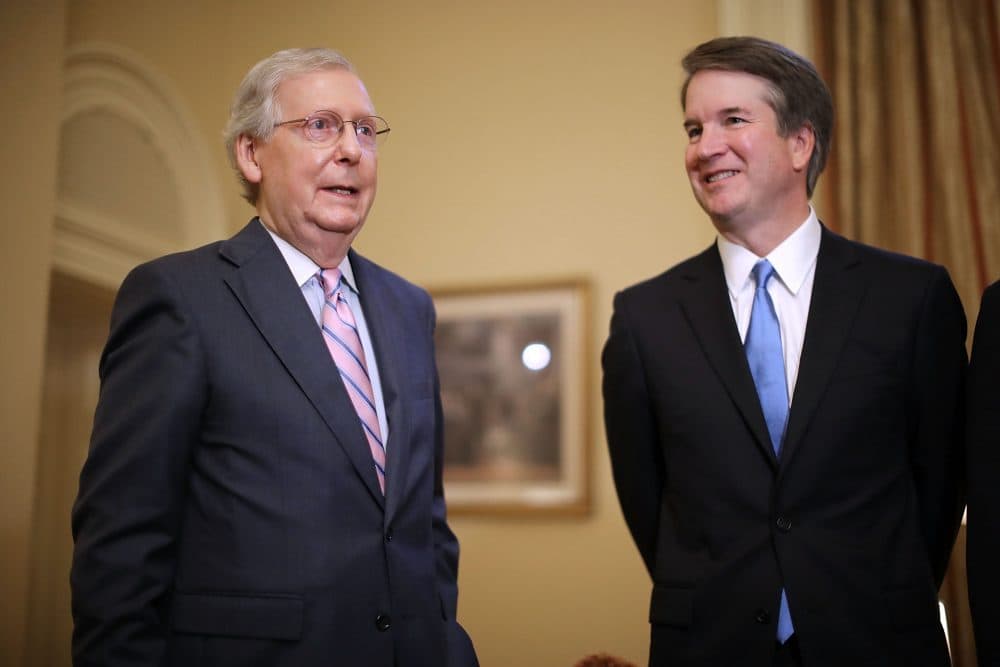 Senate Majority Leader Mitch McConnell (R-Ky.) (left) makes brief remarks before meeting with Judge Brett Kavanaugh, President Trump's nominee to replace retiring Supreme Court Justice Anthony Kennedy, in the U.S. Capitol, July 10, 2018 in Washington, D.C. (Chip Somodevilla/Getty Images)