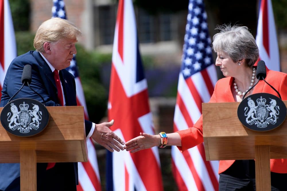 President Trump and Britain's Prime Minister Theresa May shake hands during a joint press conference following their meeting at Chequers, the prime minister's country residence, near Ellesborough, northwest of London on July 13, 2018. (Brendan Smialowski/AFP/Getty Images)