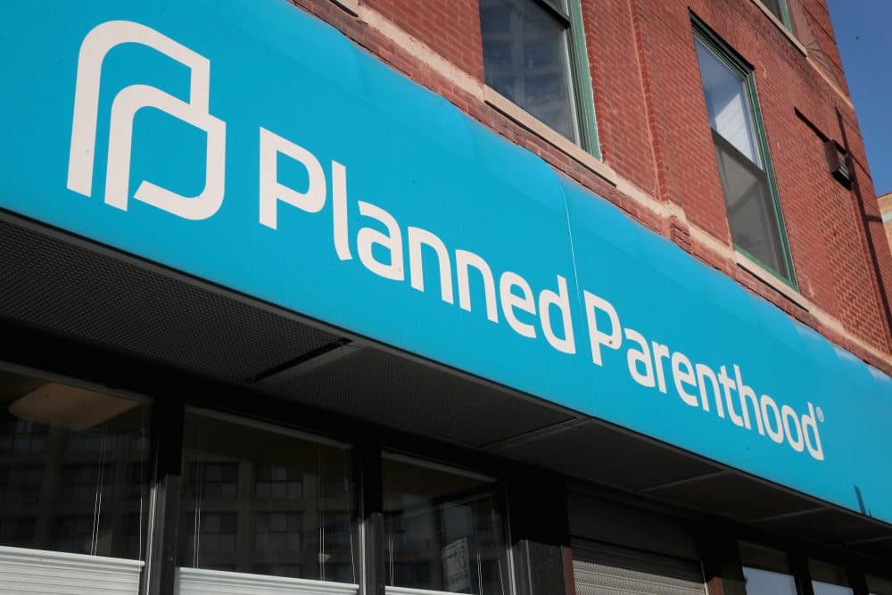 A sign hangs above a Planned Parenthood clinic in Chicago. (Scott Olson/Getty Images)