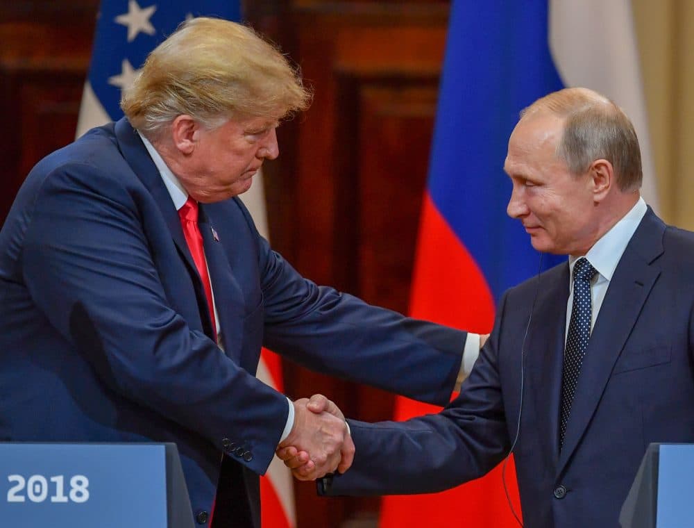 President Trump and Russia's President Vladimir Putin shake hands before attending a joint press conference after a meeting at the Presidential Palace in Helsinki, on July 16, 2018. (Yuri Kadobnov/AFP/Getty Images)
