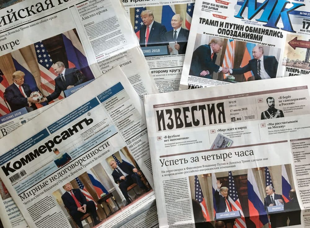 A photograph taken on July 17, 2018 in Moscow shows the front pages of Russia's main newspapers featuring pictures of the summit between President Trump and Russian President Vladimir Putin in Helsinki, Finland. (Mladen Antonov/AFP/Getty Images)