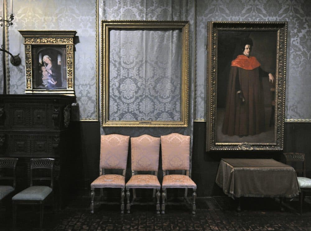 The empty frame from which thieves cut Rembrandt's &quot;Storm on the Sea of Galilee&quot; remains on display at the Isabella Stewart Gardner Museum in Boston. (Josh Reynolds/AP)