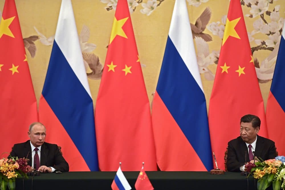 Russian President Vladimir Putin and Chinese President Xi Jinping are seen during a signing ceremony inside the Great Hall of the People in Beijing, China on June 8, 2018. (Nicolas Asfouri/Getty Images)