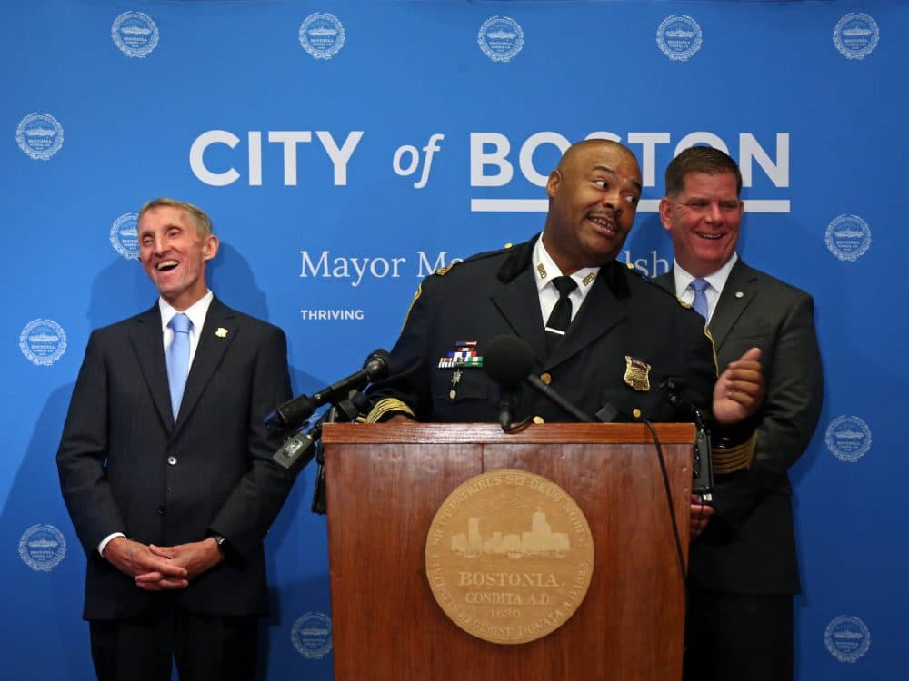 Boston Police Commissioner William Evans, left, announces his departure and Mayor Martin Walsh announces William Gross as the new Boston police commissioner during a press conference at Boston City Hall. (Courtesy of John Wilcox/the mayor's office)