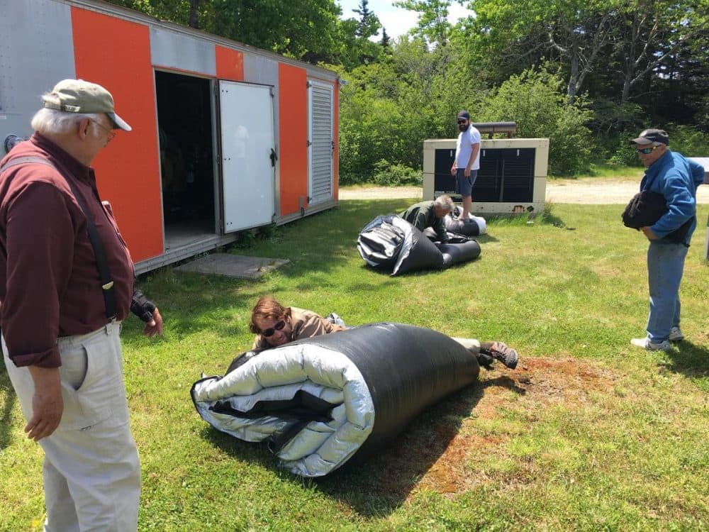 Storing tarps that protect the island's diesel generator. (Fred Bever/Maine Public Radio)