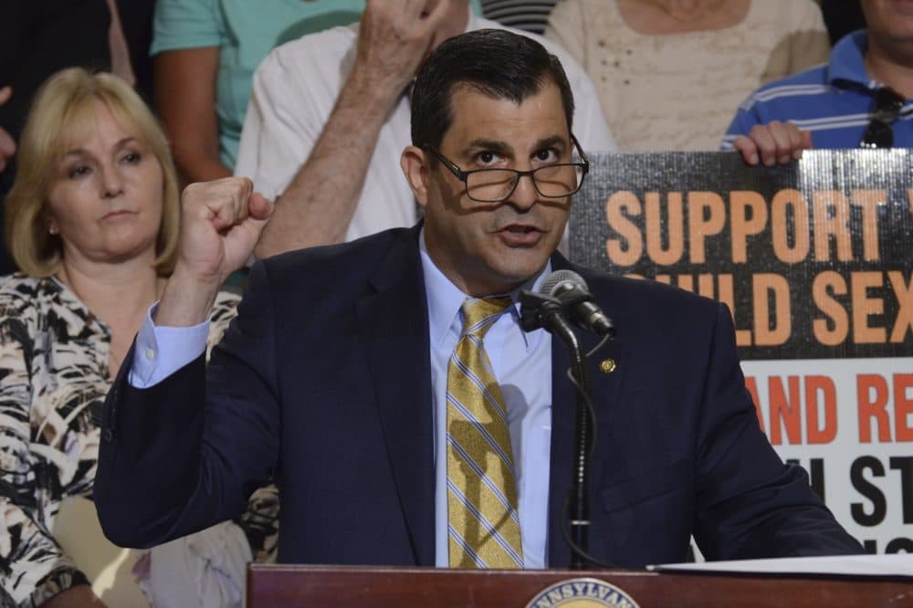 Rep. Mark Rozzi, D-Berks, speaks at a rally in Pennsylvania's Capitol to support legislation he has written to lift time limits for authorities to pursue charges of child sexual abuse and for those onetime child victims to sue their attackers and institutions that covered it up, Tuesday, June 12, 2018 in Harrisburg, Pa. Rozzi plans to renew his push for the bill after the expected publication of a sweeping grand jury report on allegations of child sexual abuse and cover-ups within six Roman Catholic dioceses around Pennsylvania. (Marc Levy/AP)