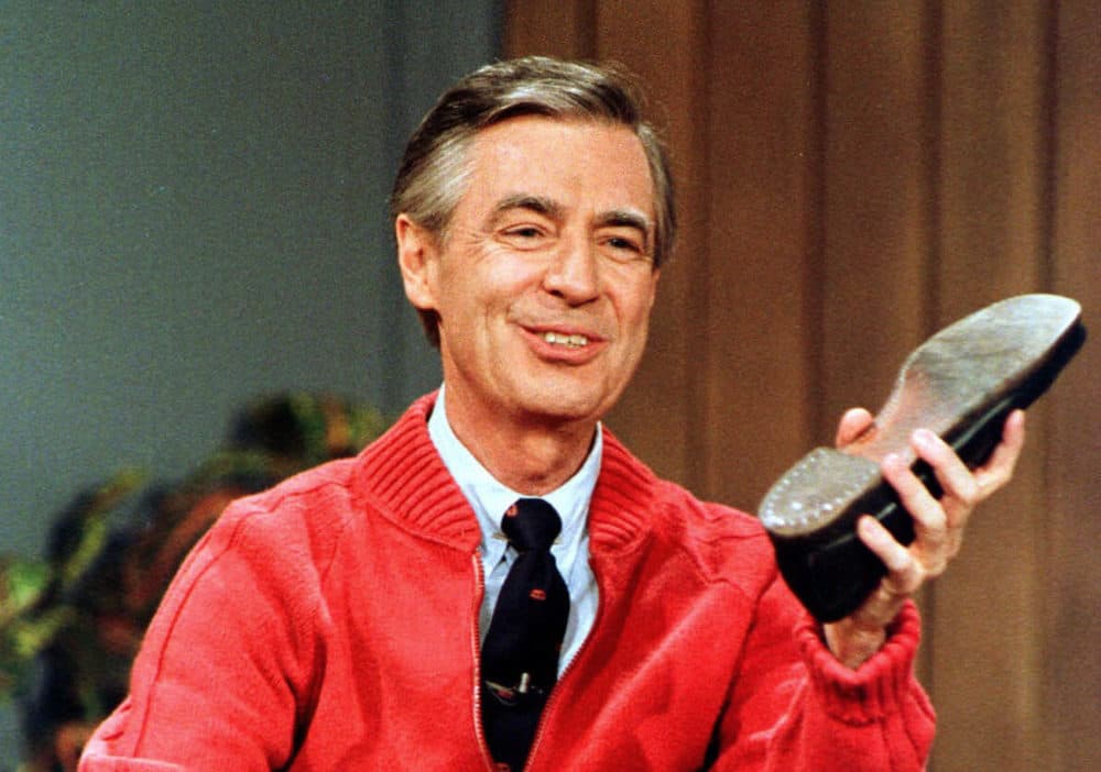 This June 28, 1989, file photo, shows Fred Rogers as he rehearses the opening of his PBS show &quot;Mister Rogers' Neighborhood&quot; during a taping in Pittsburgh. A new Fred Rogers Trail promoted by VisitPA.com includes museums, memorials and other sites. This year, 2018, marks the 50th anniversary of &quot;Mister Rogers' Neighborhood&quot; and a new documentary called &quot;Won't You Be My Neighbor?&quot; has helped rekindle interest in his legacy. (Gene J. Puskar/AP)