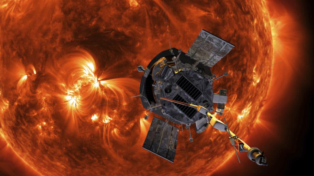 This image made available by NASA shows an artist's rendering of the Parker Solar Probe approaching the Sun. It's designed to take solar punishment like never before, thanks to its revolutionary heat shield that’s capable of withstanding 2,500 degrees Fahrenheit. (Steve Gribben/Johns Hopkins APL/NASA via AP)