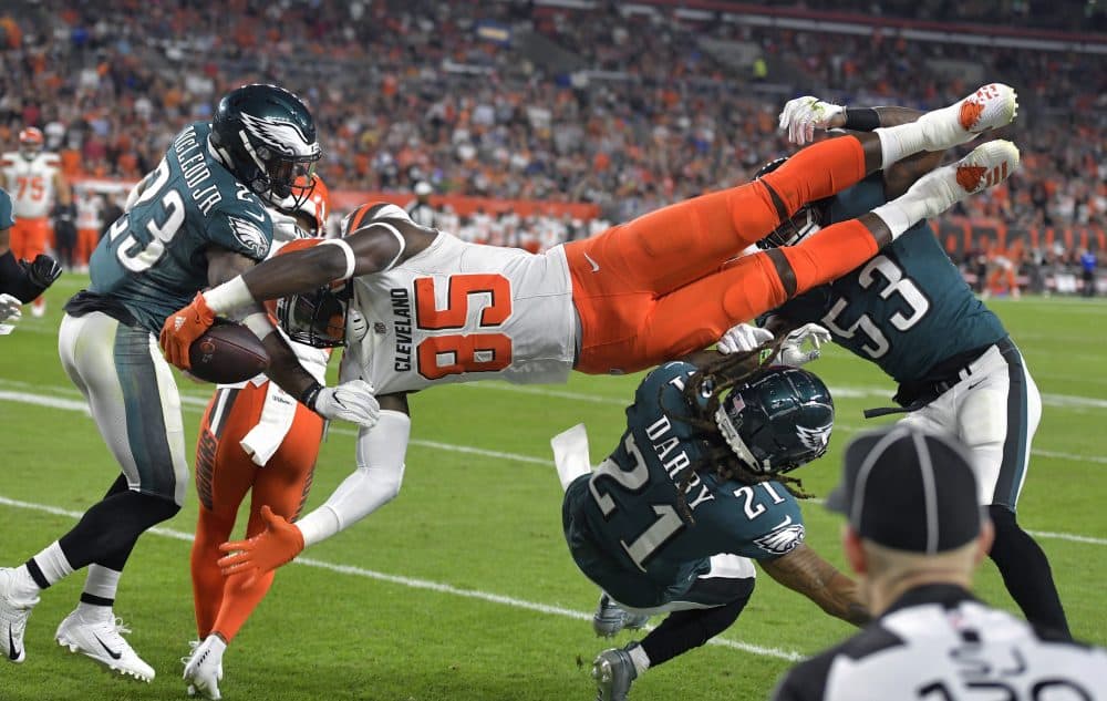 Cleveland Browns tight end David Njoku is up-ended during an NFL preseason football game against the Philadelphia Eagles in August, 2018. Las Vegas bettors apparently feel the Browns will do well this season. (AP Photo/David Richard)