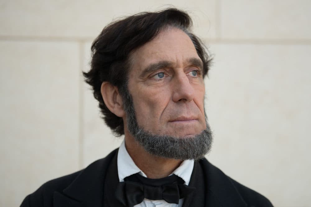 Randy Duncan, an Abraham Lincoln impersonator, poses for a portrait outside the Abraham Lincoln Presidential Library, Monday, Sept. 10, 2018, in Springfield, Ill. (Neeta Satam for Here & Now)
