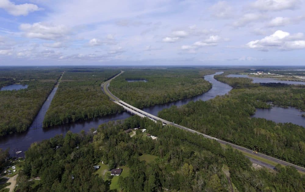 The Cape Fear River rises under a closed Interstate 40 just north of Wilmington, N.C., in Castle Hayne N.C., Monday, Sept. 17, 2018. (Tom Copeland/AP)