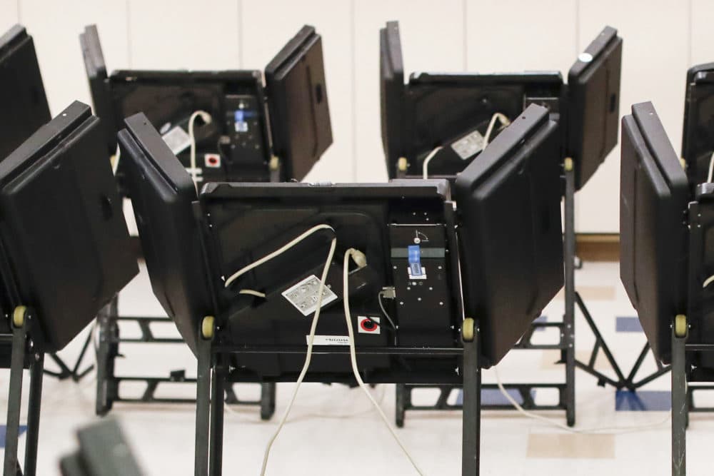 Electronic voting machines in a polling station in Dublin, Ohio, on Aug. 7, 2018. (John Minchillo/AP)