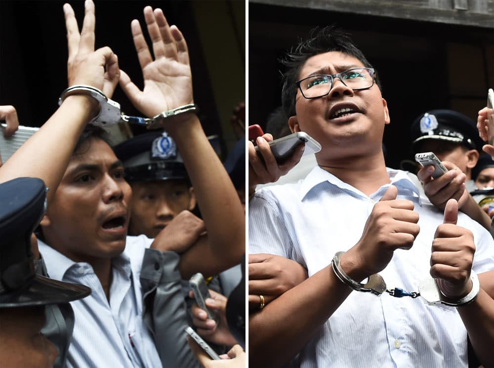 This combo shows journalists Kyaw Soe Oo (left) and Wa Lone (right) being escorted by police after their sentencing by a court to jail in Yangon on Sept. 3, 2018. (Ye Aung Thu/AFP/Getty Images)