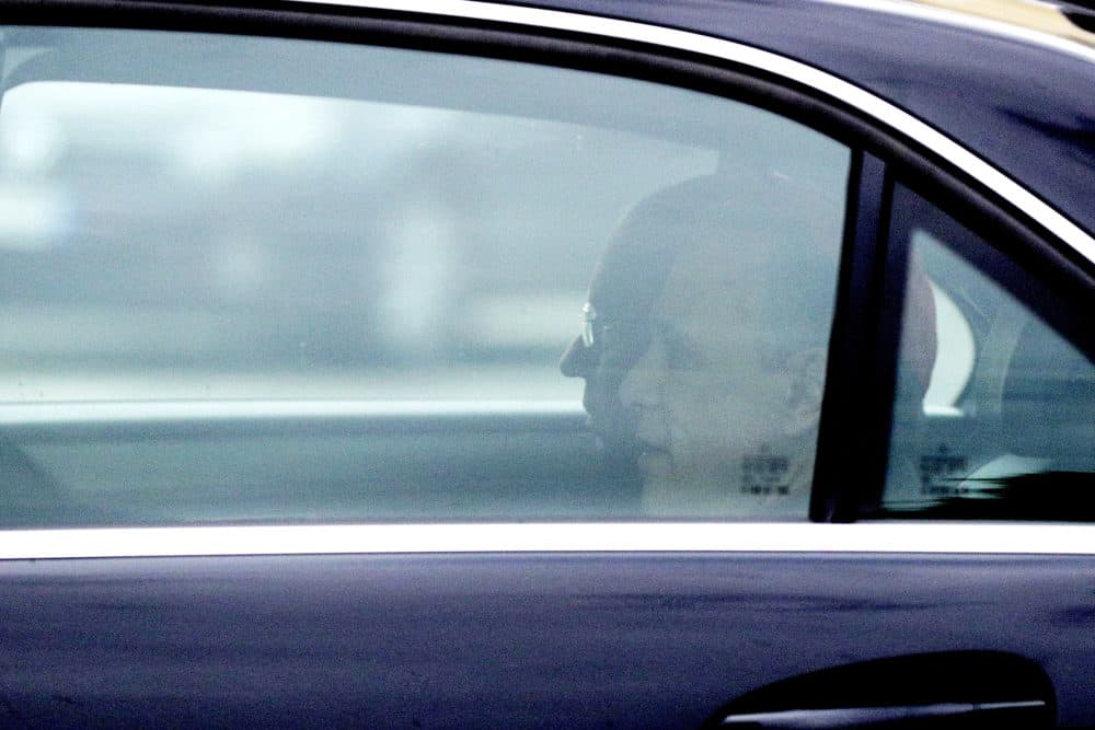 Archbishop Jose Gomez, left, and Cardinal Daniel DiNardo sit inside a car as they arrive at the Perugino Gate to meet with Pope Francis, at the Vatican, Thursday, Sept. 13, 2018. (AP Photo/Gregorio Borgia)