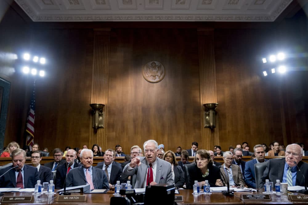 Senate Judiciary Committee Chairman Chuck Grassley, R-Iowa, center, accompanied by Sen. Lindsey Graham, R-S.C., left, Sen. Orrin Hatch, R-Utah, second from left, Sen. Dianne Feinstein, D-Calif., the ranking member, second from right, and Sen. Patrick Leahy, D-Vt., right, speaks during a Senate Judiciary Committee markup meeting on Capitol Hill, Thursday, Sept. 13, 2018, in Washington. (Andrew Harnik/AP)