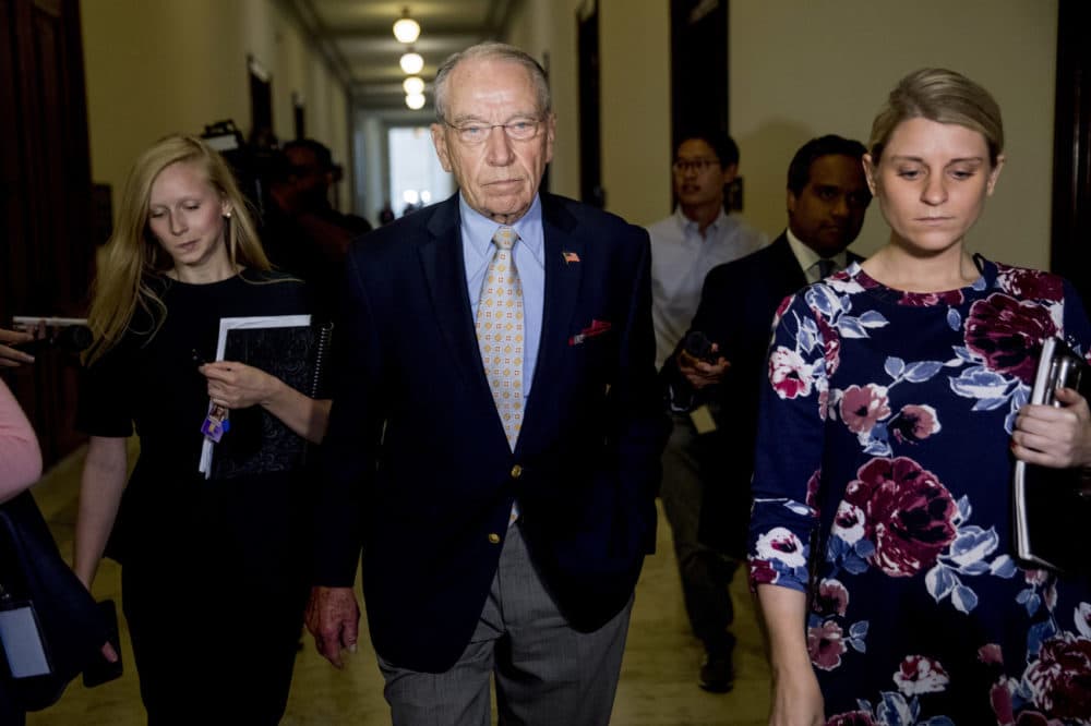 Senate Judiciary Committee Chairman Chuck Grassley, R-Iowa, departs after speaking to reporters on Capitol Hill, Wednesday, Sept. 19, 2018, in Washington. Christine Blasey Ford wants the FBI to investigate her allegation that she was sexually assaulted by Supreme Court nominee Brett Kavanaugh before she testifies at a Senate Judiciary Committee hearing next week. (AP Photo/Andrew Harnik)