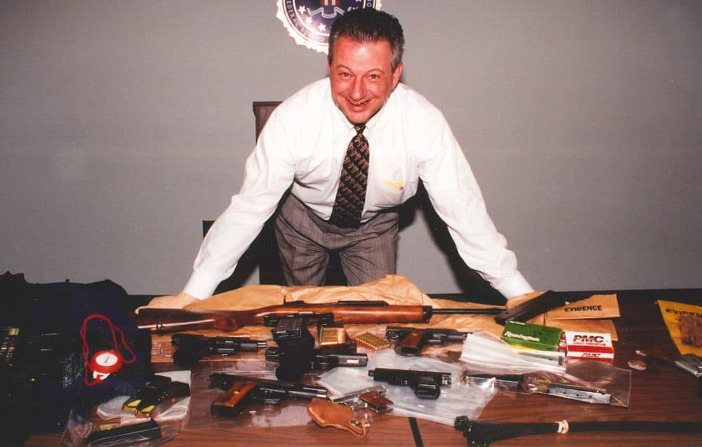 FBI Agent David Nadolski with the material seized after the thwarted Loomis heist. (Courtesy)