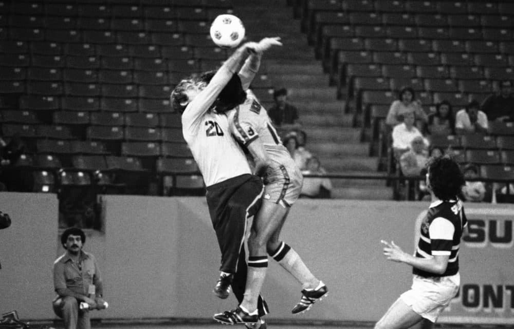 Chicago Sting goalie David Flaschen (20) collides with Detroit's Danny Vaughn in a 1978 game. The Sting's season was highlighted by games against the Cuban national team in Havana and in Chicago. (AP)