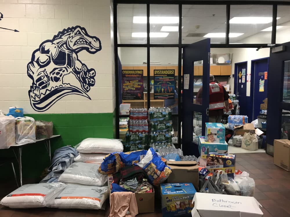 Donations at the shelter at Arlington Middle School in Lawrence (Shannon Dooling/WBUR)