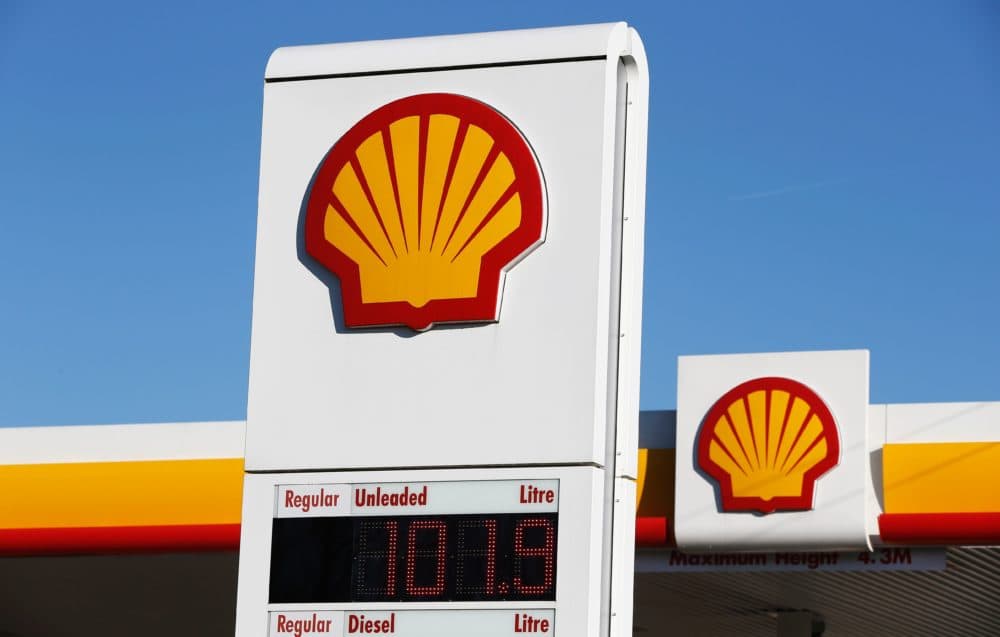 Shell logos are pictured outside a Royal Dutch Shell petrol station in Hook, near Basingstoke, England. (Adrian Dennis/AFP/Getty Images)