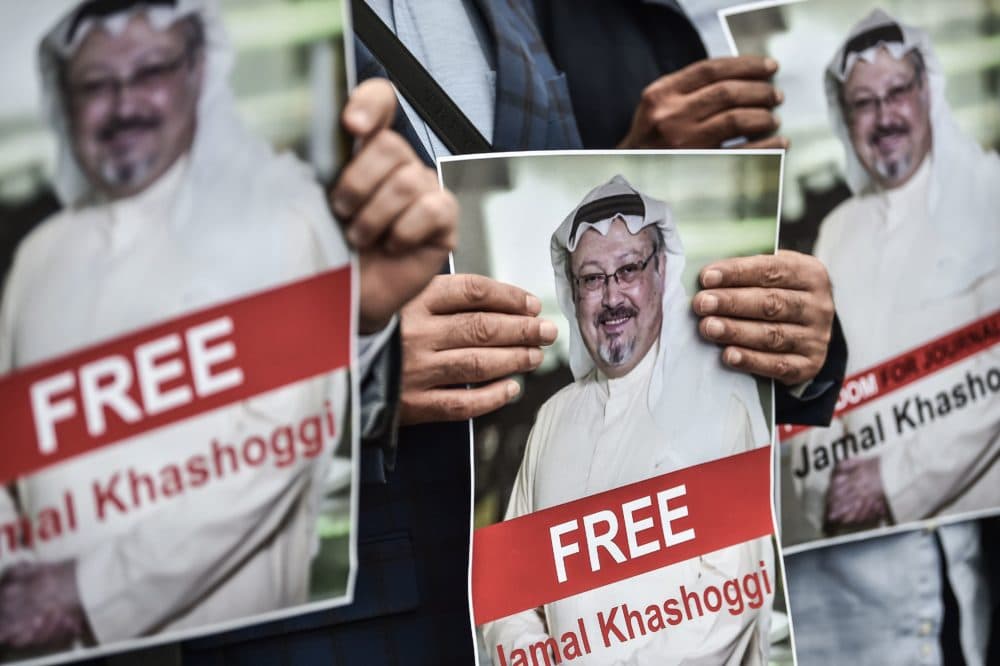 Protesters hold pictures of missing journalist Jamal Khashoggi during a demonstration in front of the Saudi Arabian consulate on Oct. 8, 2018 in Istanbul. (Ozan Kose/AFP/Getty Images)