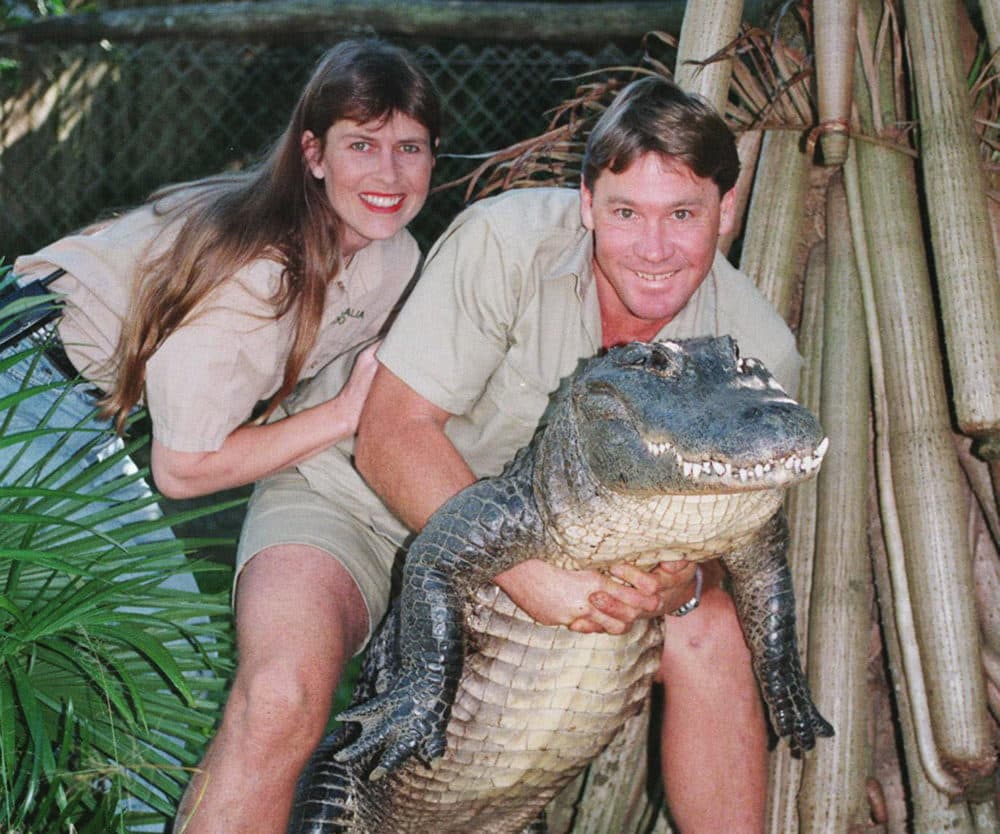 In this June 18, 1999 file photo, Steve Irwin, &quot;The Crocodile Hunter&quot; holds a nine-foot female alligator accompanied by his American wife Terri at his &quot;Australia Zoo&quot; in Beerwah, Queensland, Australia. In 2006, Steve Irwin was killed by stingray in the waters off Australia while filming. (Russell McPhedran/AP/File)