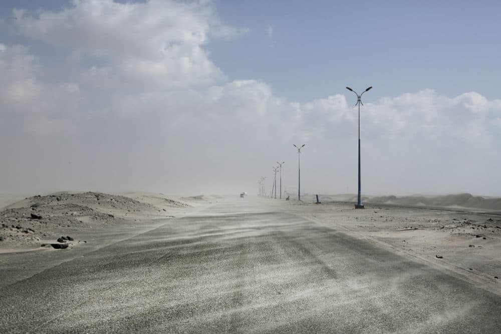 This Feb. 15, 2018, photo shows sand drifting over an empty highway from Abyan to Aden in Yemen. Violence, famine and disease have ravished the country of some 28 million, which was already the Arab world’s poorest before the conflict began. (Nariman El-Mofty/AP)