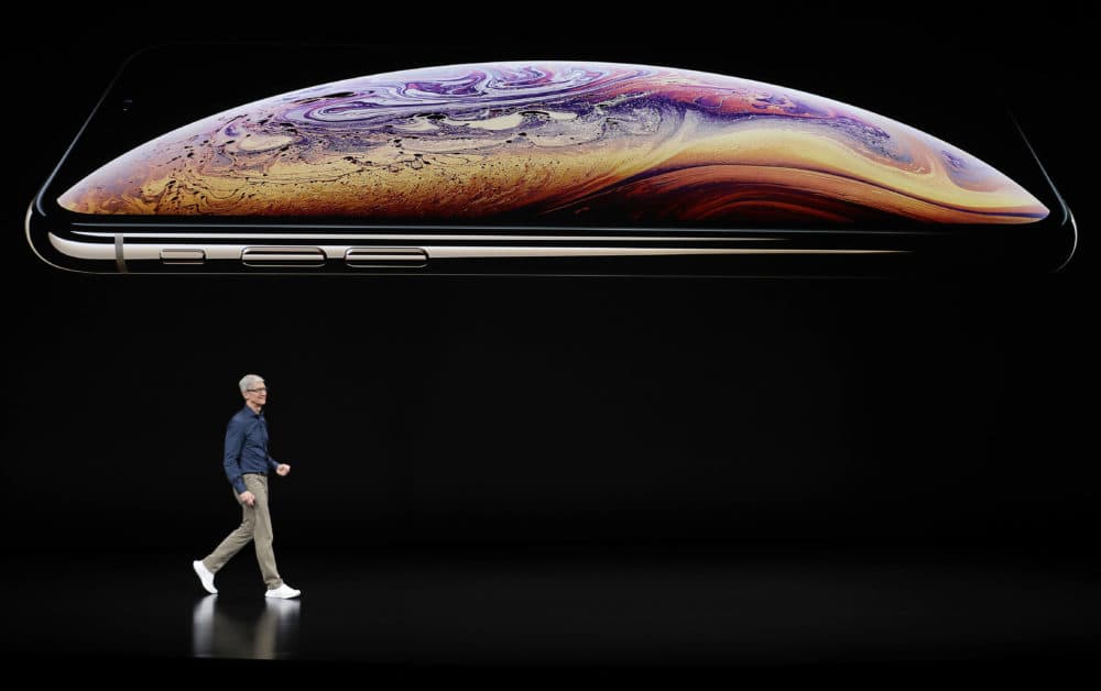 Apple CEO Tim Cook speaks about the Apple iPhone XS at the Steve Jobs Theater during an event to announce new Apple products Wednesday, Sept. 12, 2018, in Cupertino, Calif. (Marcio Jose Sanchez/AP)