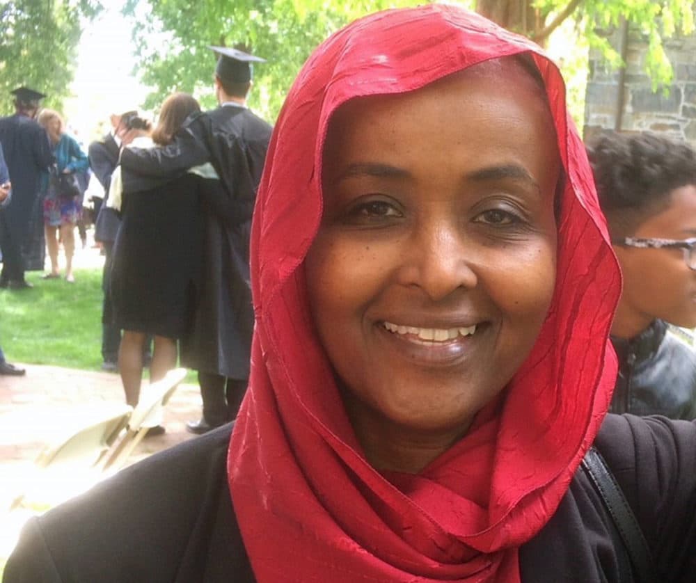 This May 21, 2017, photo provided by Hiwaida Elarabi and Iman Ahmed shows Elarabi at a graduation ceremony in Medford, Mass. When Elarabi, a Sudanese immigrant, learned the U.S. government was ending the temporary protected status that allowed her to live and work in the country legally for two decades, she sold off the restaurant that had been her life's dream. (Iman Ahmed/Courtesy of Hiwaida Elarabi via AP)