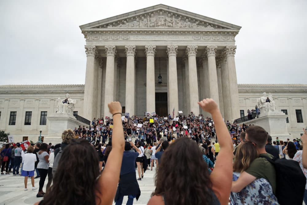 Activists protest on the steps and plaza of the Supreme Court after the confirmation vote of Brett Kavanaugh on Saturday. (Alex Brandon/AP)