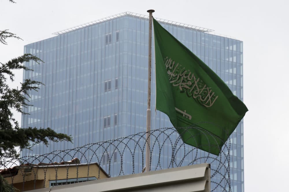A Saudi Arabia flag flies on the roof of Saudi Arabia's consulate in Istanbul, Friday, Oct. 12, 2018. A senior Turkish official says Turkey and Saudi Arabia will form a &quot;joint working group&quot; to look into the disappearance of Saudi writer Jamal Khashoggi. (AP Photo/Petros Giannakouris)