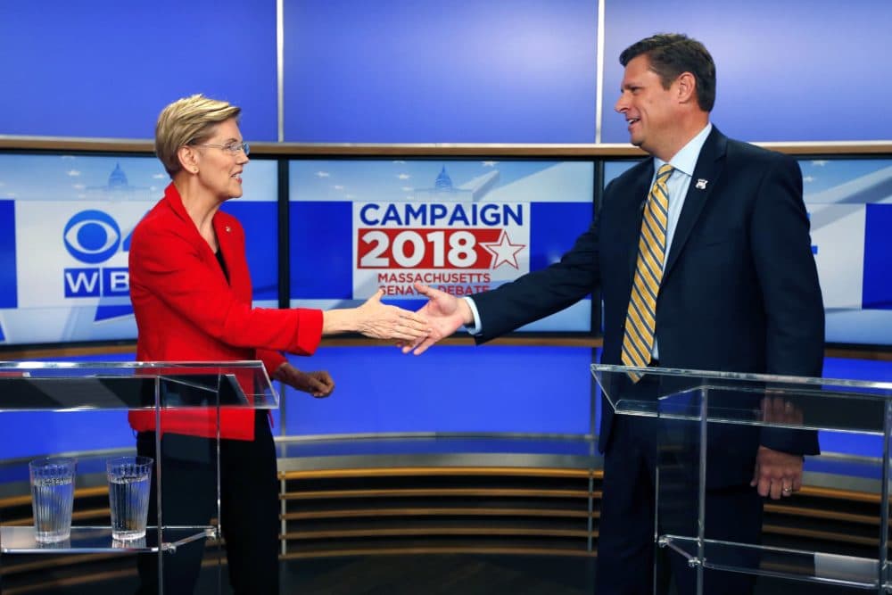 Massachusetts Senate candidates Sen. Elizabeth Warren, left, and her opponent State Rep. Geoff Diehl shake hands before a debate in Boston. (Michael Dwyer/AP)