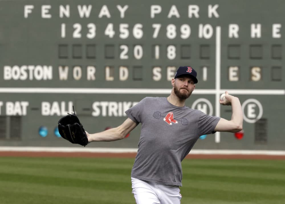 Red Sox pitcher Chris Sale throws during a workout Sunday in Boston, as he prepares to start Game 1 of the World Series against the Los Angeles Dodgers. (Elise Amendola/AP)