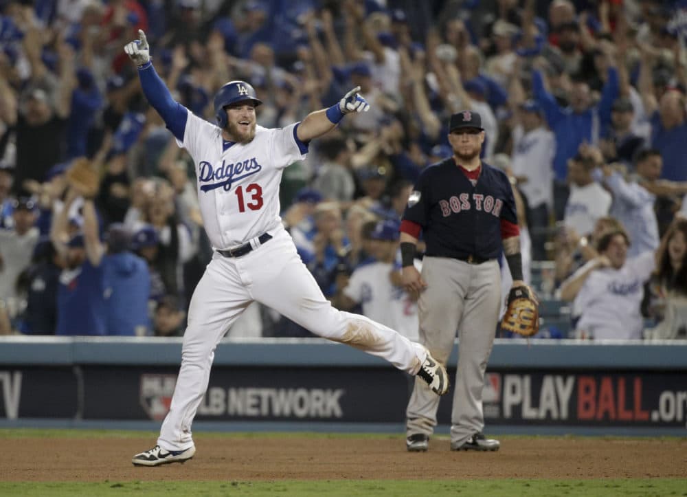 Los Angeles Dodgers' Max Muncy celebrates after his walk off home run against the Boston Red Sox during the 18th inning in Game 3 of the World Series baseball game on Saturday, Oct. 27, 2018, in Los Angeles. (Jae C. Hong/AP)
