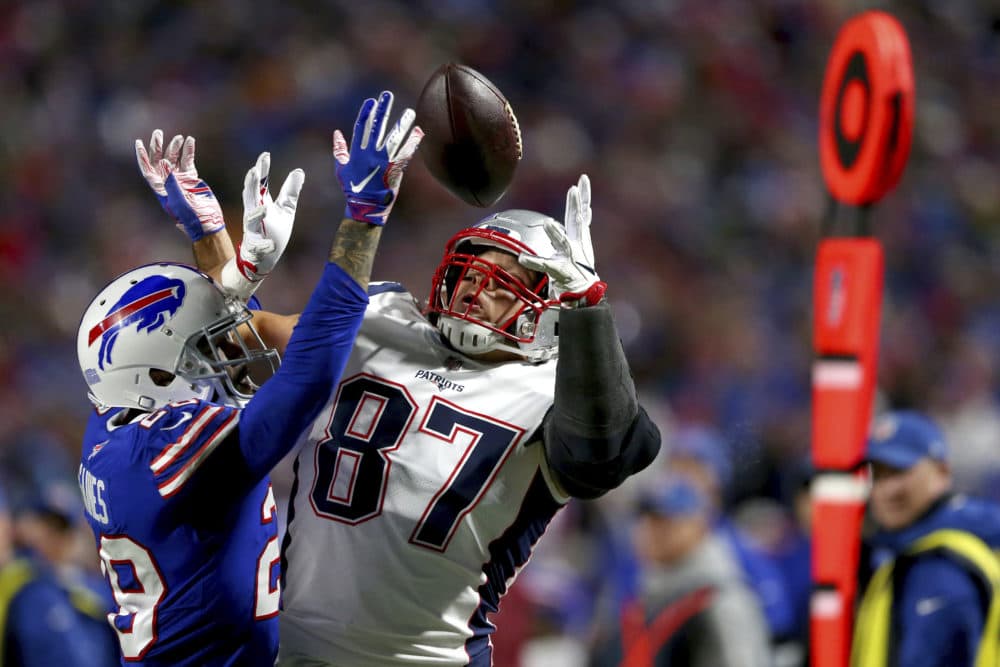 New England Patriots tight end Rob Gronkowski, right, eyes the ball before making a catch against Buffalo Bills defensive back Phillip Gaines during the second half of an NFL football game, Monday, Oct. 29, 2018, in Orchard Park, N.Y. (Jeffrey T. Barnes/AP)