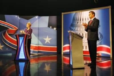 Sen. Elizabeth Warren and GOP candidate Geoff Diehl engage in a political debate hosted at WCVB studios in Needham on Tuesday. (Michael Swensen/The Boston Globe via AP, Pool)