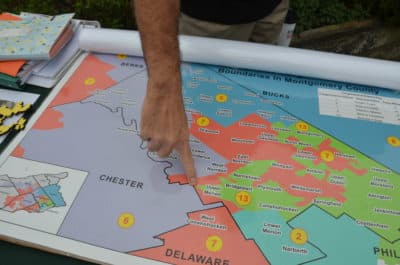 Fair Districts PA organizer Rich Rafferty points to a spot in the old PA-07 district in Montgomery County. The old PA-07 was considered a poster child for gerrymandering. (Alex Schroeder/On Point)