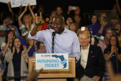 Florida Democratic gubernatorial nominee Andrew Gillum speaks as U.S. Sen. Bill Nelson (D-Fla.) listens behind him during a campaign rally held at the University of South Florida Campus Recreation Building on Monday in Tampa, Fla. (Joe Raedle/Getty Images)