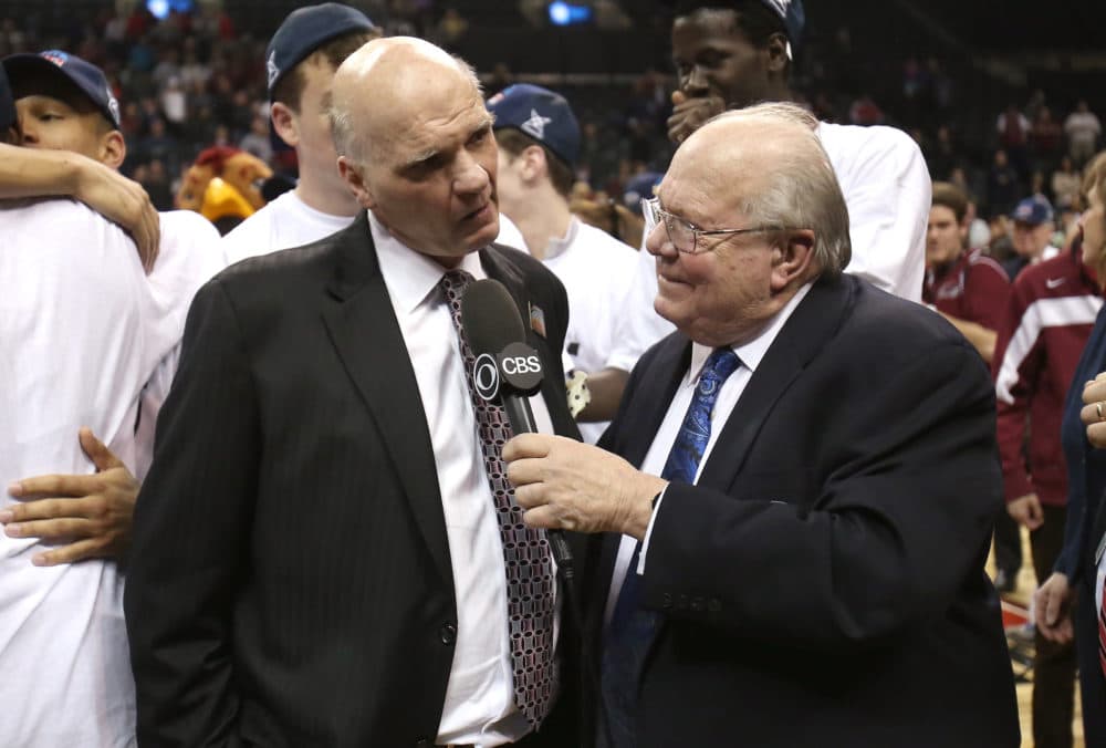 NEW YORK, NY - MARCH 16:  Head coach Phil Martelli of the Saint Joseph's Hawks is interviewed by Verne Lundquist of CBS after defeating the Virginia Commonwealth Rams during the Championship game of the 2014 Atlantic 10 Men's Basketball Tournament at Barclays Center on March 16, 2014 in the Brooklyn borough of New York City. The Hawks beat the Rams 65-61.  (Photo by Mike Lawrie/Getty Images)