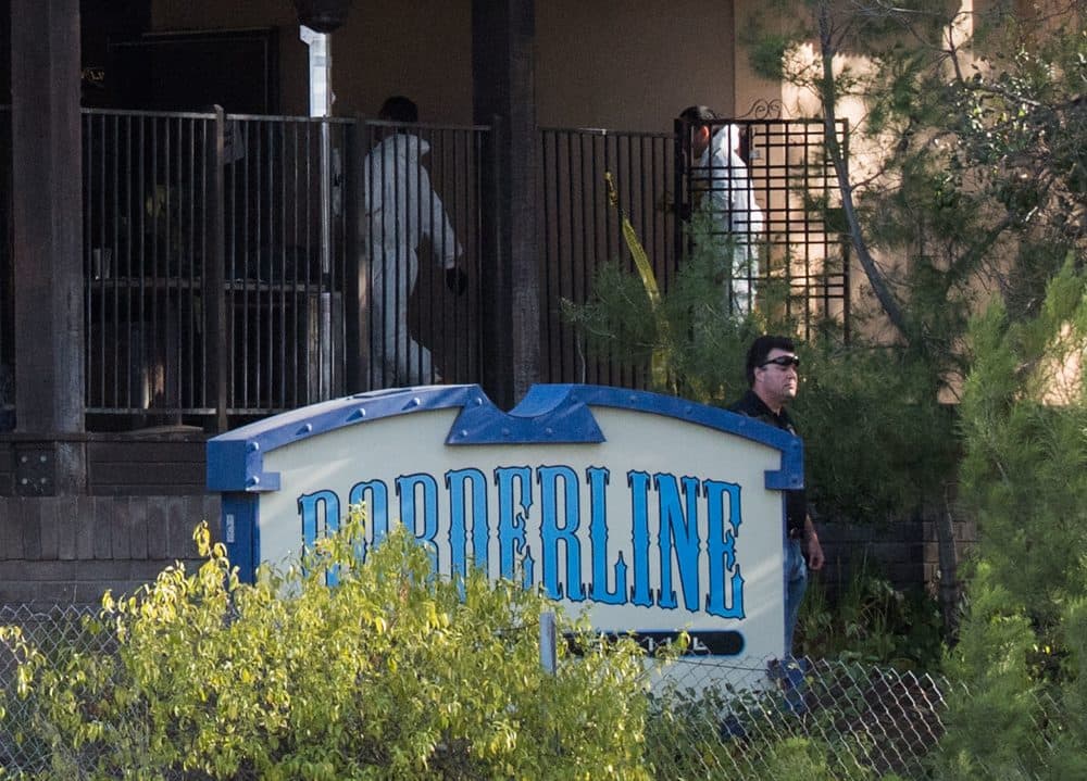 Investigators work at the scene of a mass shooting at the Borderline Bar & Grill in Thousand Oaks, Calif., on Nov. 8, 2018. (Robyn Beck/AFP/Getty Images)