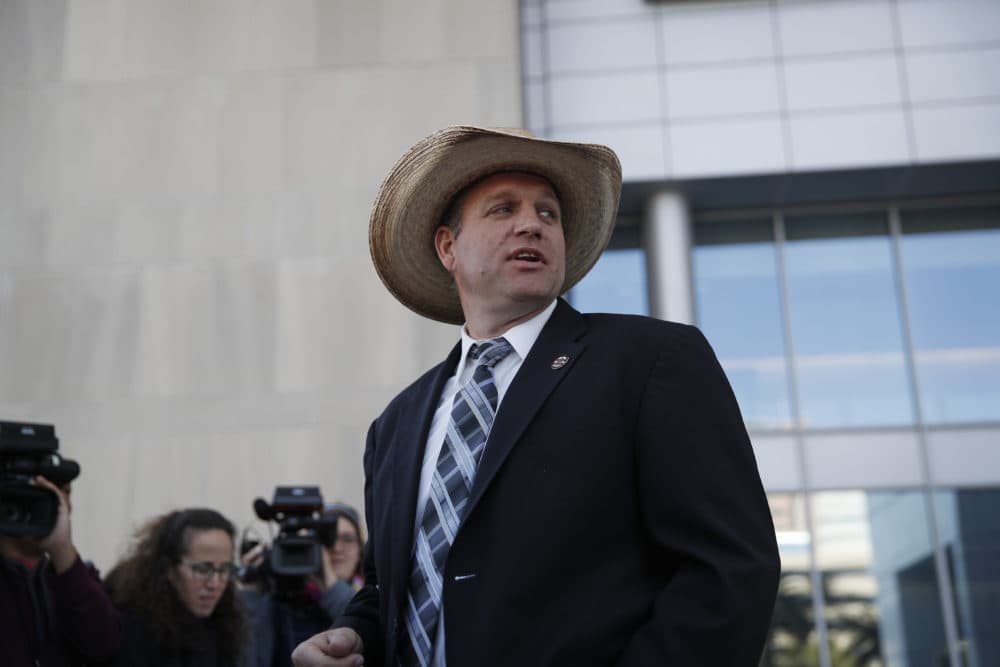 In this Dec. 20, 2017 photo, Ammon Bundy walks out of a federal courthouse in Las Vegas. (John Locher/AP)