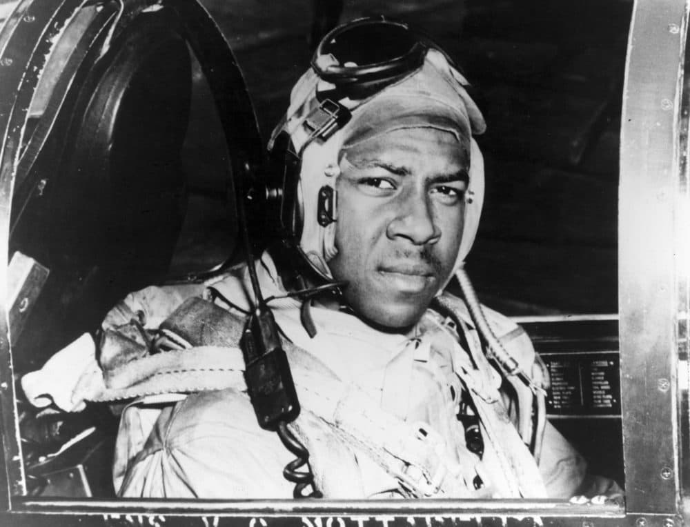 This circa 1950 photo released by the U.S. Navy shows Jesse Brown in the cockpit of an F4U-4 Corsair fighter at an unidentified location. Brown, the first African-American naval aviator, died when he crashed behind enemy lines during the Korean War. Fellow aviator Thomas Hudner crash-landed his own plane in a futile attempt to save Brown. (U.S Navy via AP)