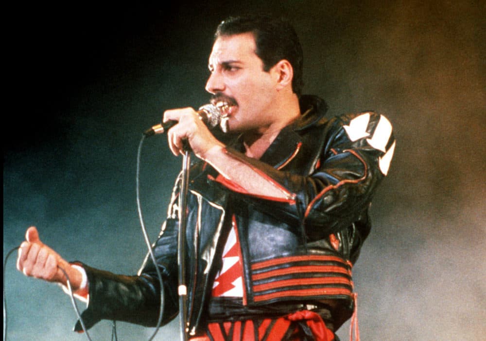 FILE - In this 1985 file photo, singer Freddie Mercury of the rock group Queen, performs at a concert in Sydney, Australia. Queen guitarist Brian May says an asteroid in Jupiter's orbit has been named after the band's late frontman Freddie Mercury on what would have been his 70th birthday, it was reported on Monday, Sept. 5, 2016. May says the International Astronomical Union's Minor Planet Centre has designated an asteroid discovered in 1991, the year of Mercury's death, as &quot;Asteroid 17473 Freddiemercury.&quot; (AP Photo/Gill Allen, File)