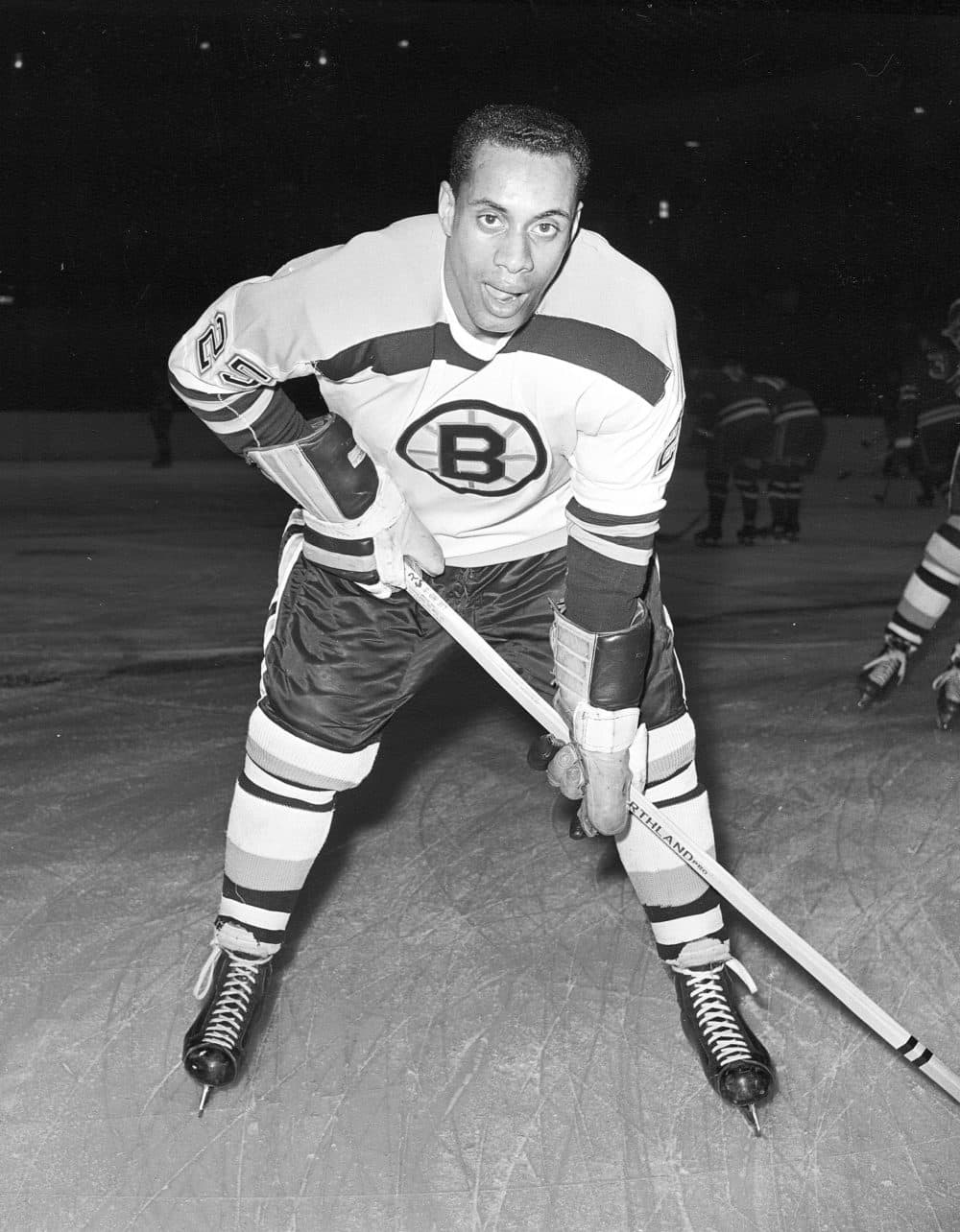In this Nov. 23, 1960, file photo, 25-year-old left wing Willie O'Ree, the first black player of the National Hockey League, poses for a photo as he warms up in his Boston Bruins uniform prior to an NHL game with the New York Rangers at New York's Madison Square Garden. O'Ree was selected to the Hockey Hall of Fame on June 26, 2018. (AP)