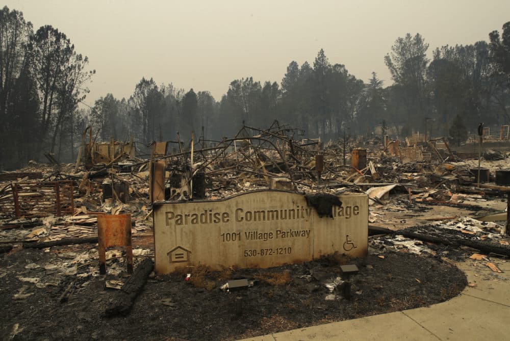 A sign stands at a community destroyed by the Camp fire, Tuesday, Nov. 13, 2018, in Paradise, Calif. (John Locher/AP)